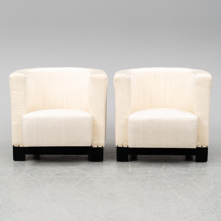 A pair of Italian easy chairs, late 20th Century.