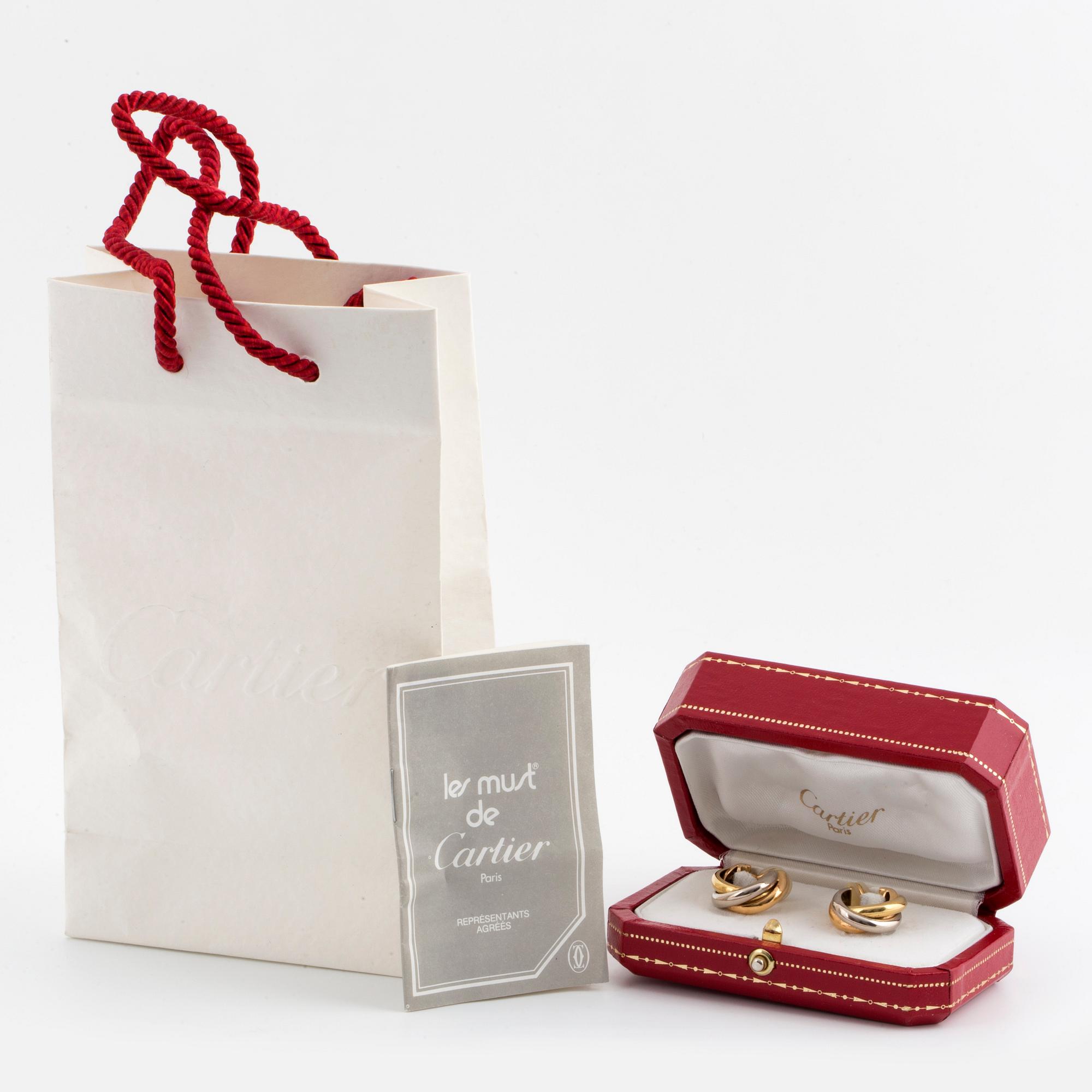 A pair of Cartier 'Trinity' earrings.