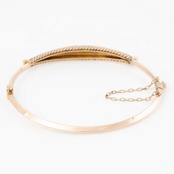 Armring, 9K guld med små diamanter och rubiner, sent 1800-tal/tidigt 1900-tal.