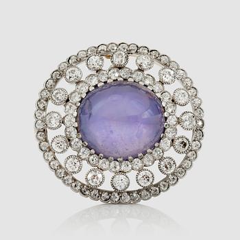 1183. A natural untreated violet star sapphire and old-cut diamond brooch/pendant.