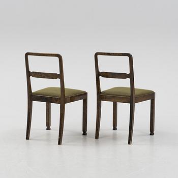 A Swedish Grace birch dining table and four chairs, 1920's/1930's.