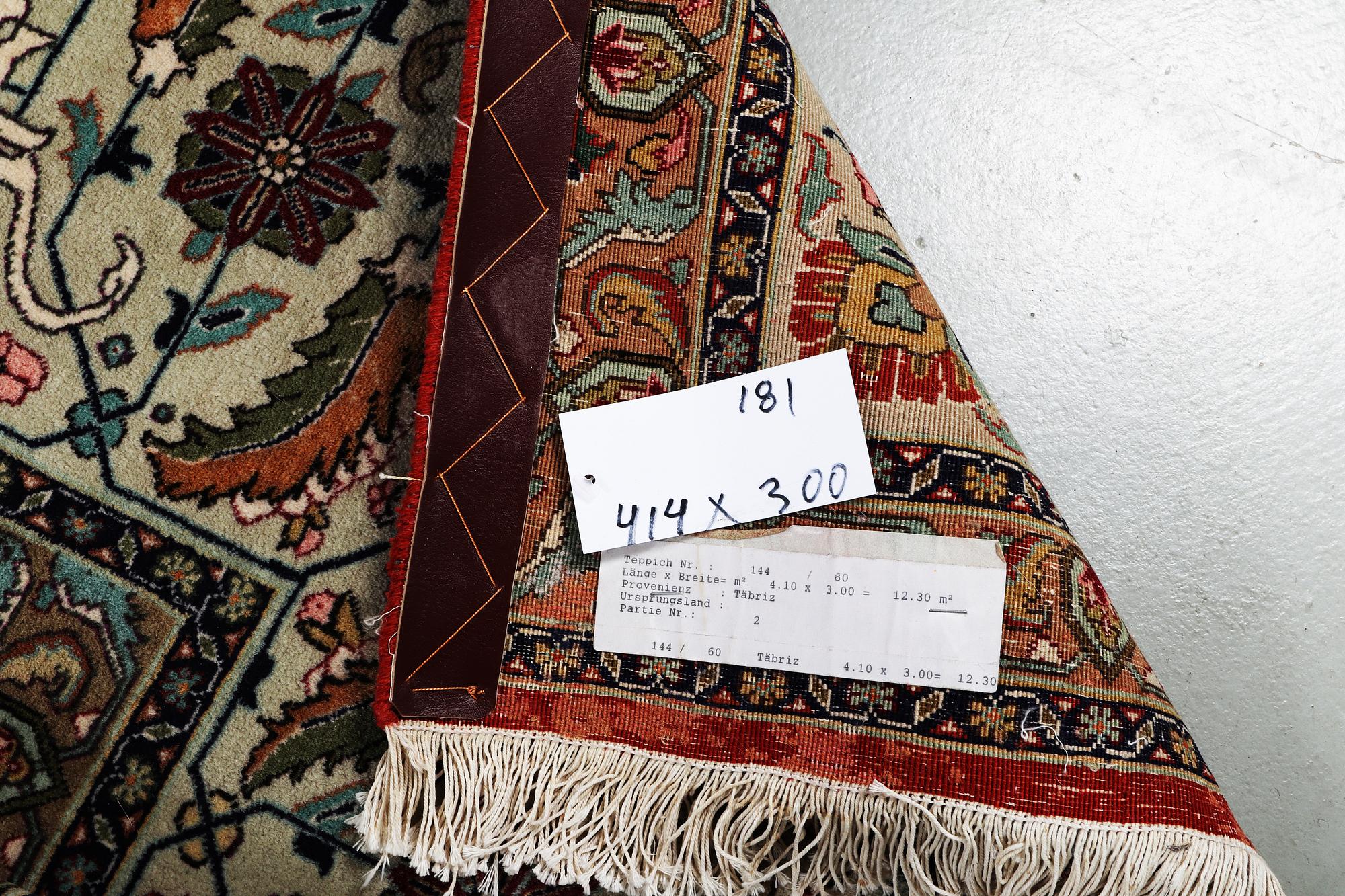 A carpet, Tabriz, part silk, 50 raj, ca 414 x 300 cm.