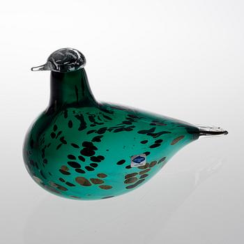 A glass bird signed O. Toikka Nuutajärvi.