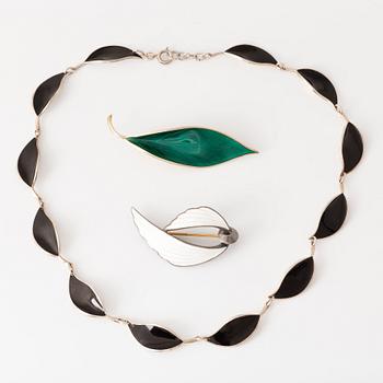 David Andersen, necklace and two brooches, silver and enamel.