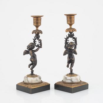 A pair of candlesticks, mid 19th Century.