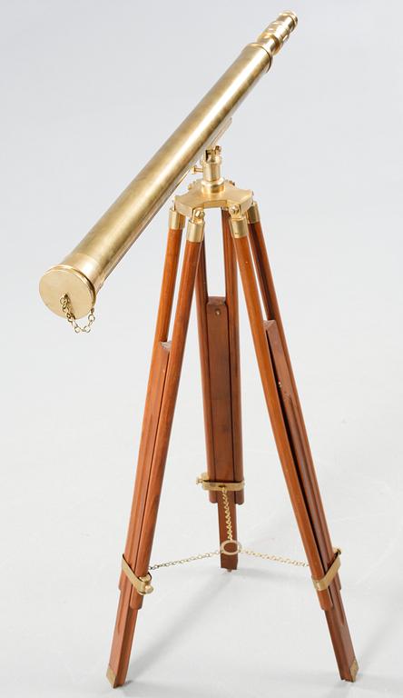 A spotting scope with a wooden stand, second half of the 20th century.