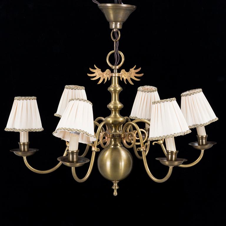 A 20th century baroque style brass ceiling light.