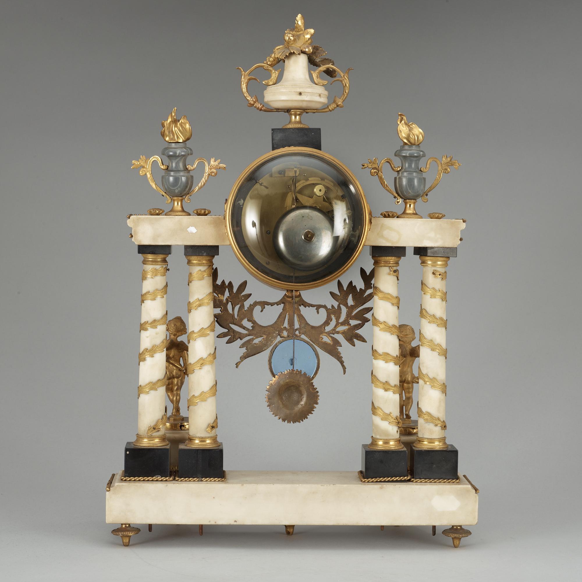 A Louis XVI late 18th Century mantel clock.