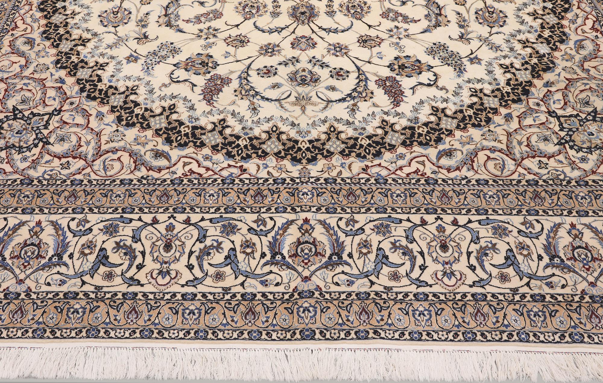 A Nain part silk carpet, 407 x 304 cm.