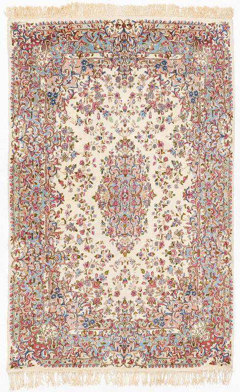 A carpet, semi-antique/old, Kerman, approx. 263 x 174 cm.