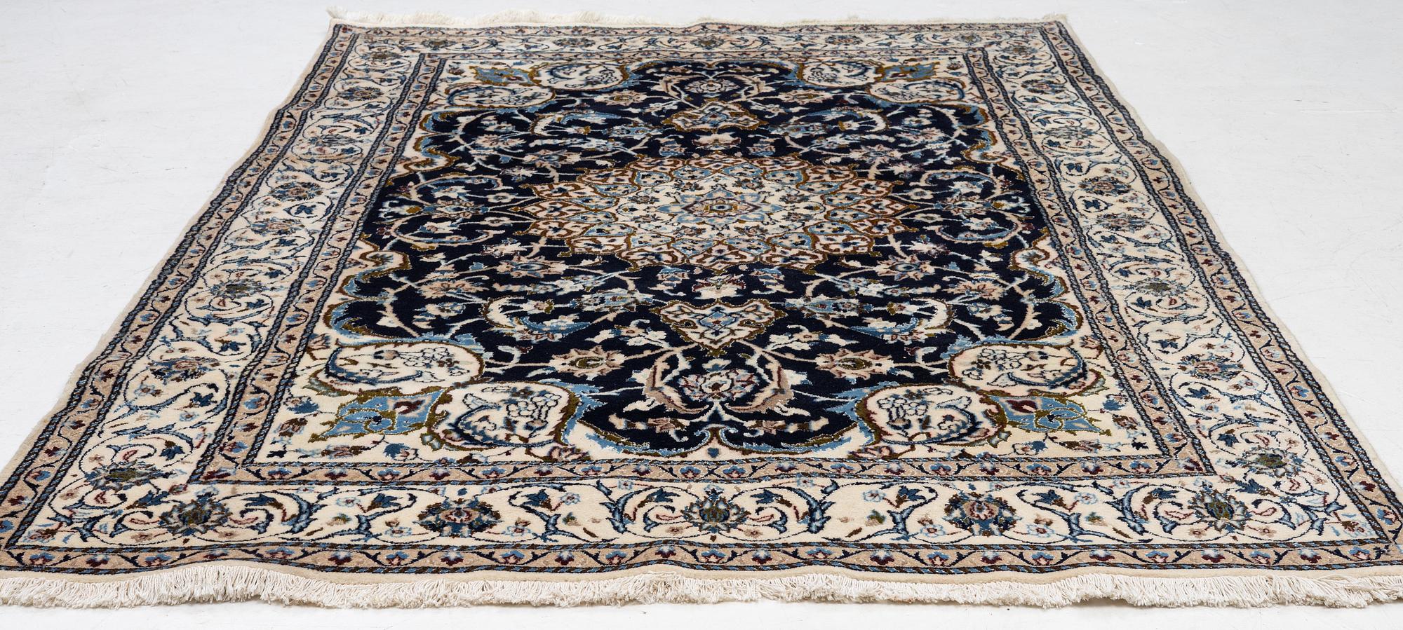 A Nain carpet, Central Persia, c. 300 x 195 cm.