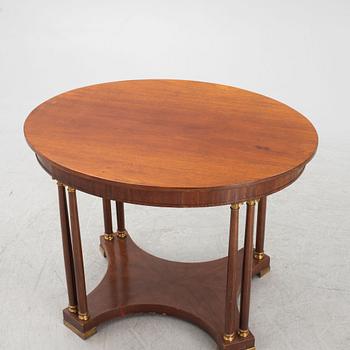 An Empire style table, early 20th Century.