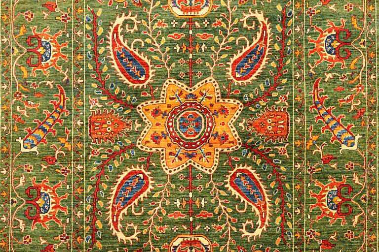 A Kazak carpet, c. 304 x 205 cm.