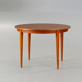 A dining table made in the middle of the 20th century.