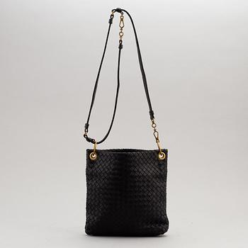 Bottega Veneta, a black intrecciato handbag.