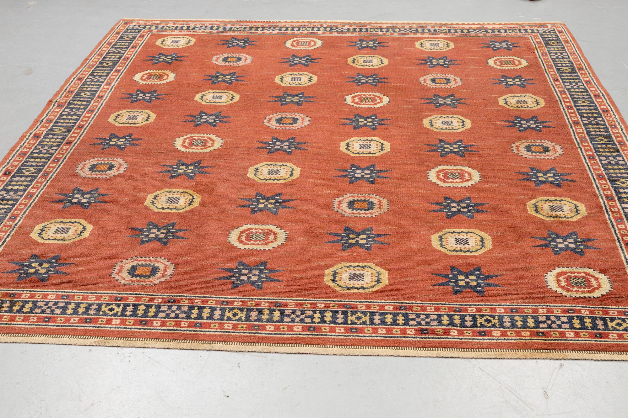 Märta Måås-Fjetterström, a carpet, "Röd Flossa", knotted pile, ca 300 x 272 cm, signed AB MMF.