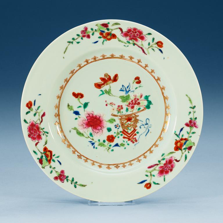 A set of 12 famille rose dinner plates, Qing dynasty, Qianlong (1736-95).