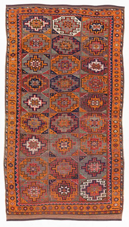 A Kurdish Carpet, circa 235 x 126 cm.