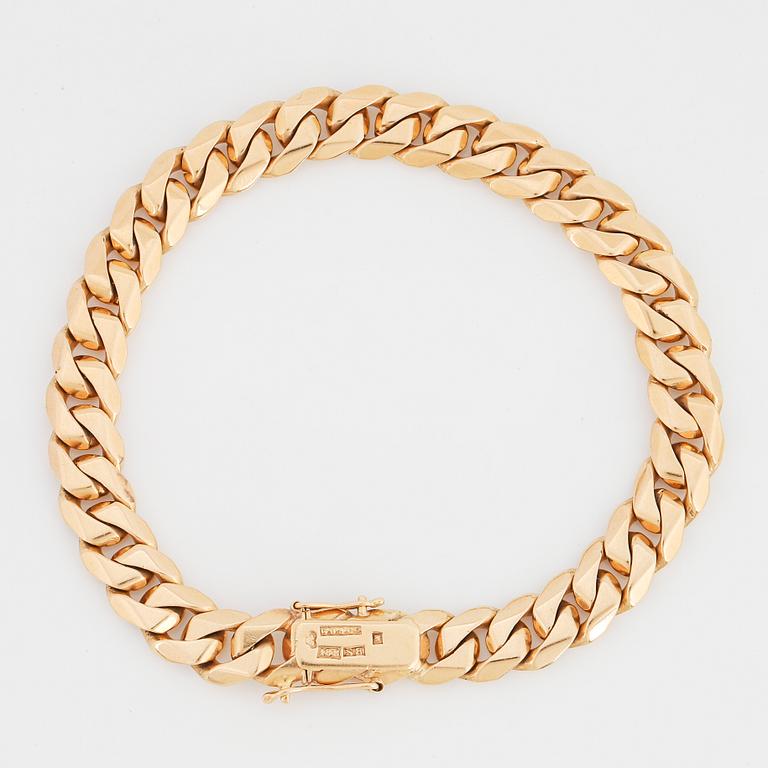 Armband 18K guld manglad pansar.