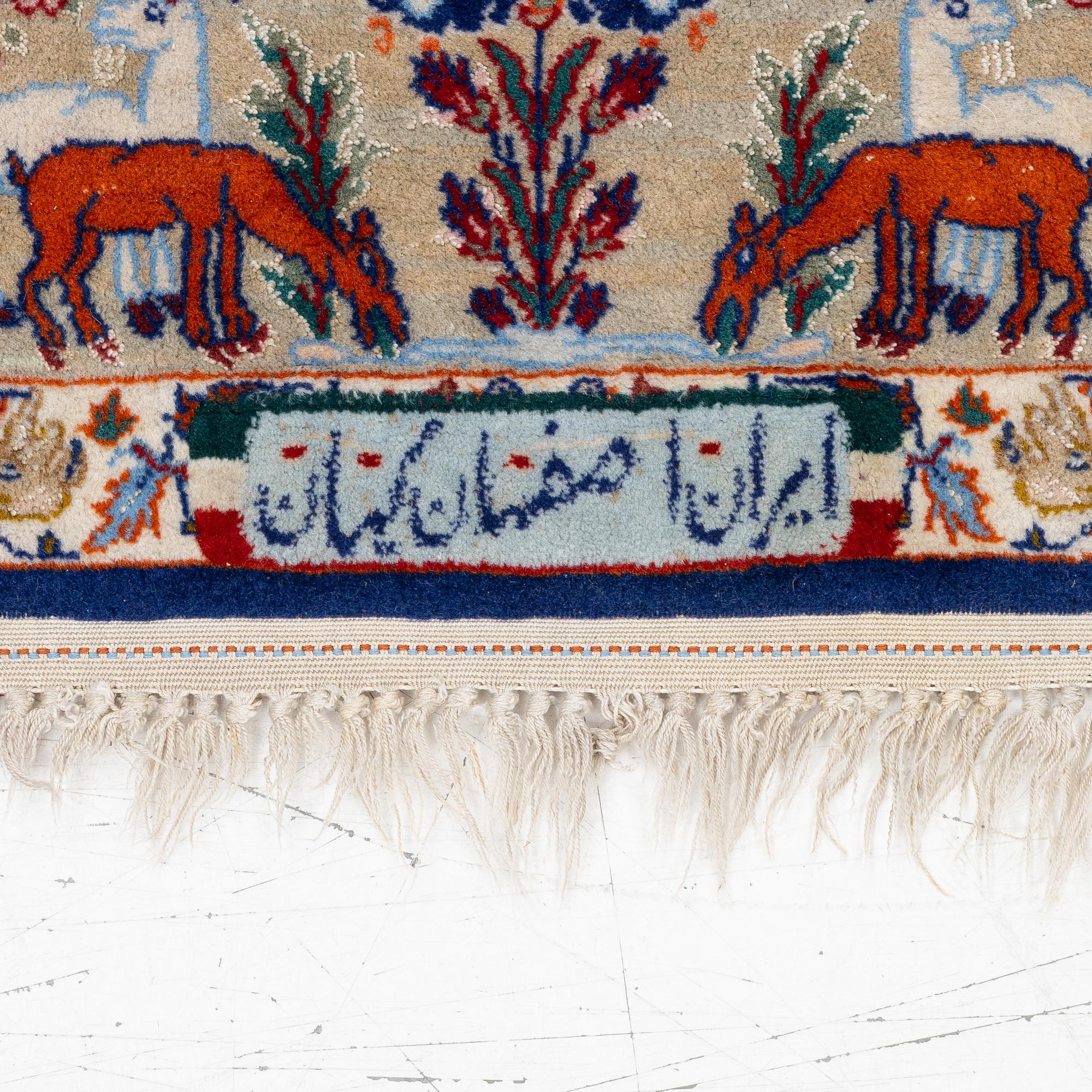 An oriental, figural, signed rug, c. 162 x 104 cm.
