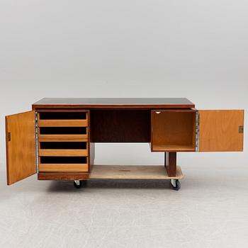 A stained desk, 1940's.