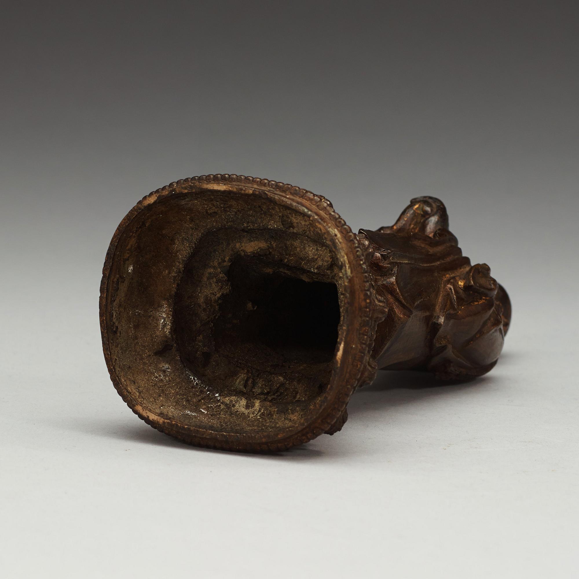 A bronze figure of a Lohan, Ming dynasty, 17th Century.