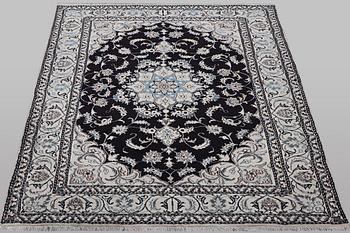 A carpet, Nain, part silk, ca 9 laa, ca 290 x 194 cm.