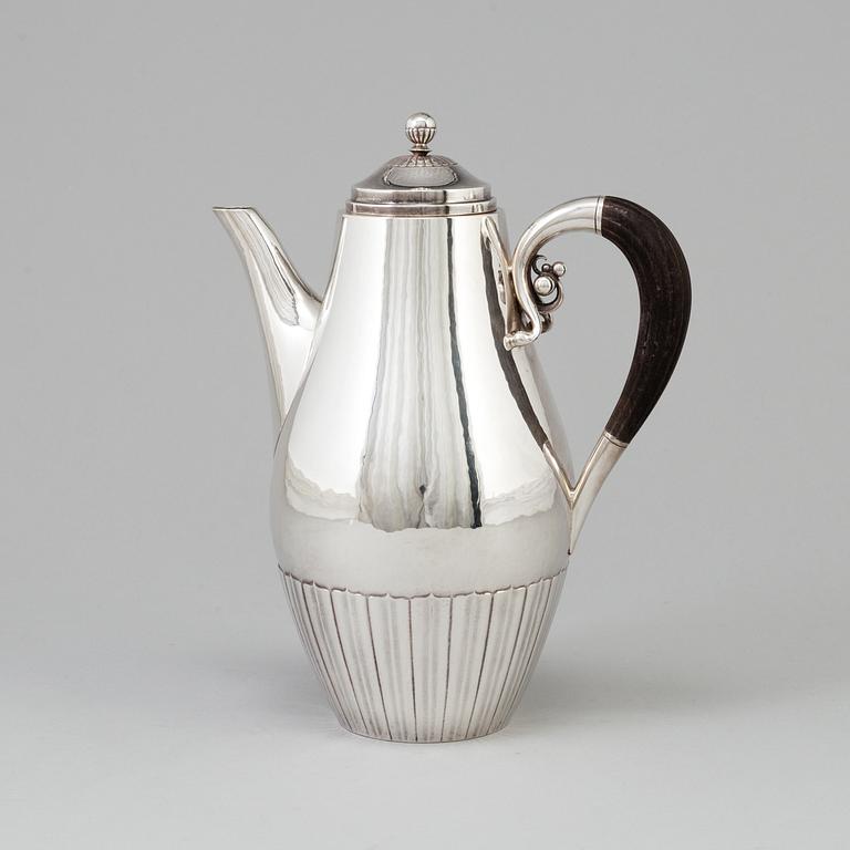 A silver coffee pot, designed by Johan Rodhe for Georg Jensen, Denmark, after 1945. Weight ca 647 grams.