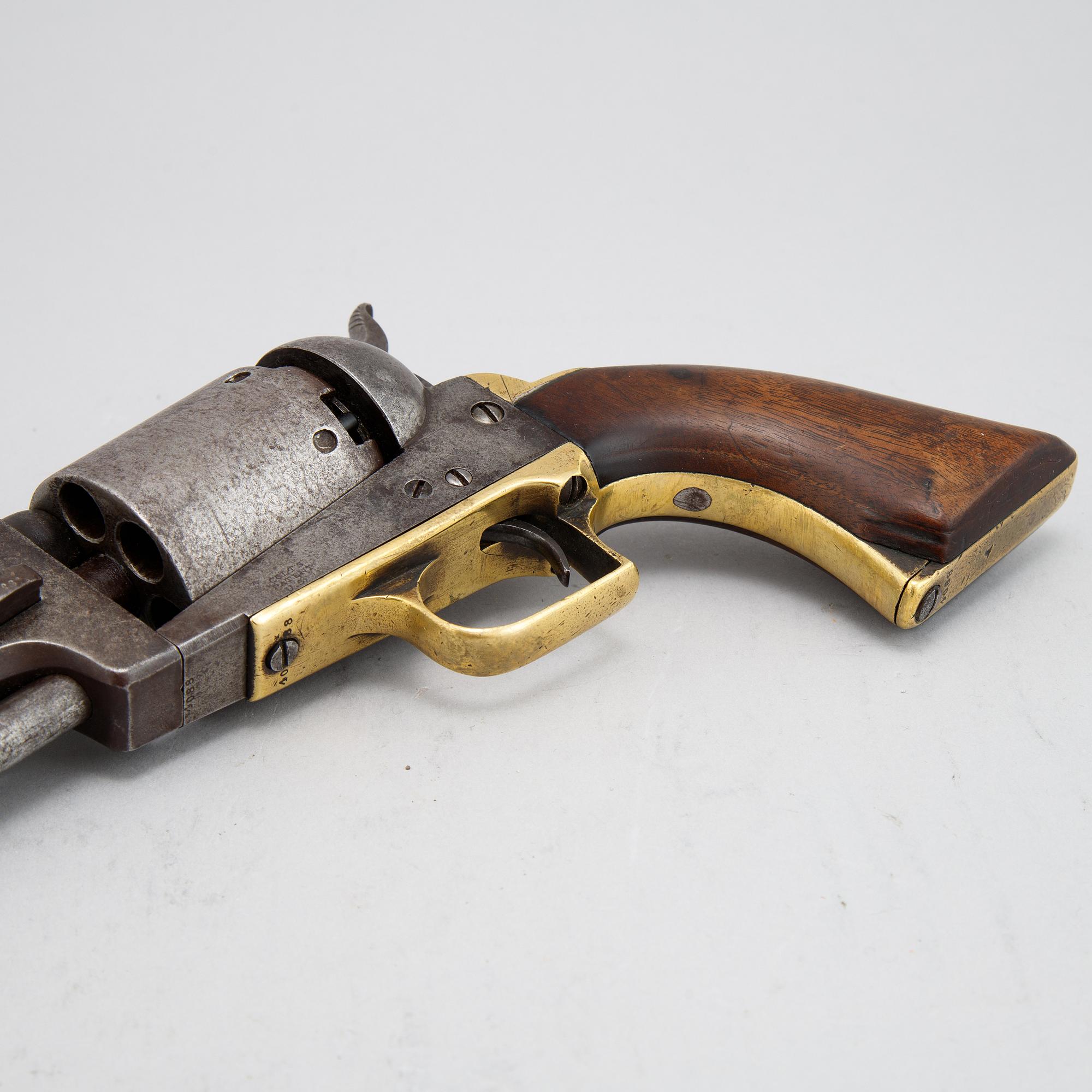 A Colt Dragoon first model percussion revolver with replacement barrel with British marks. serial no on other parts 4088.