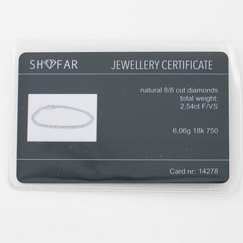 Tennisarmband 18K vitguld med åttkantslipade diamanter.