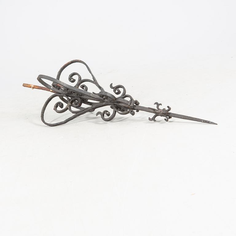 An around 1900s cast iron roof ornament.