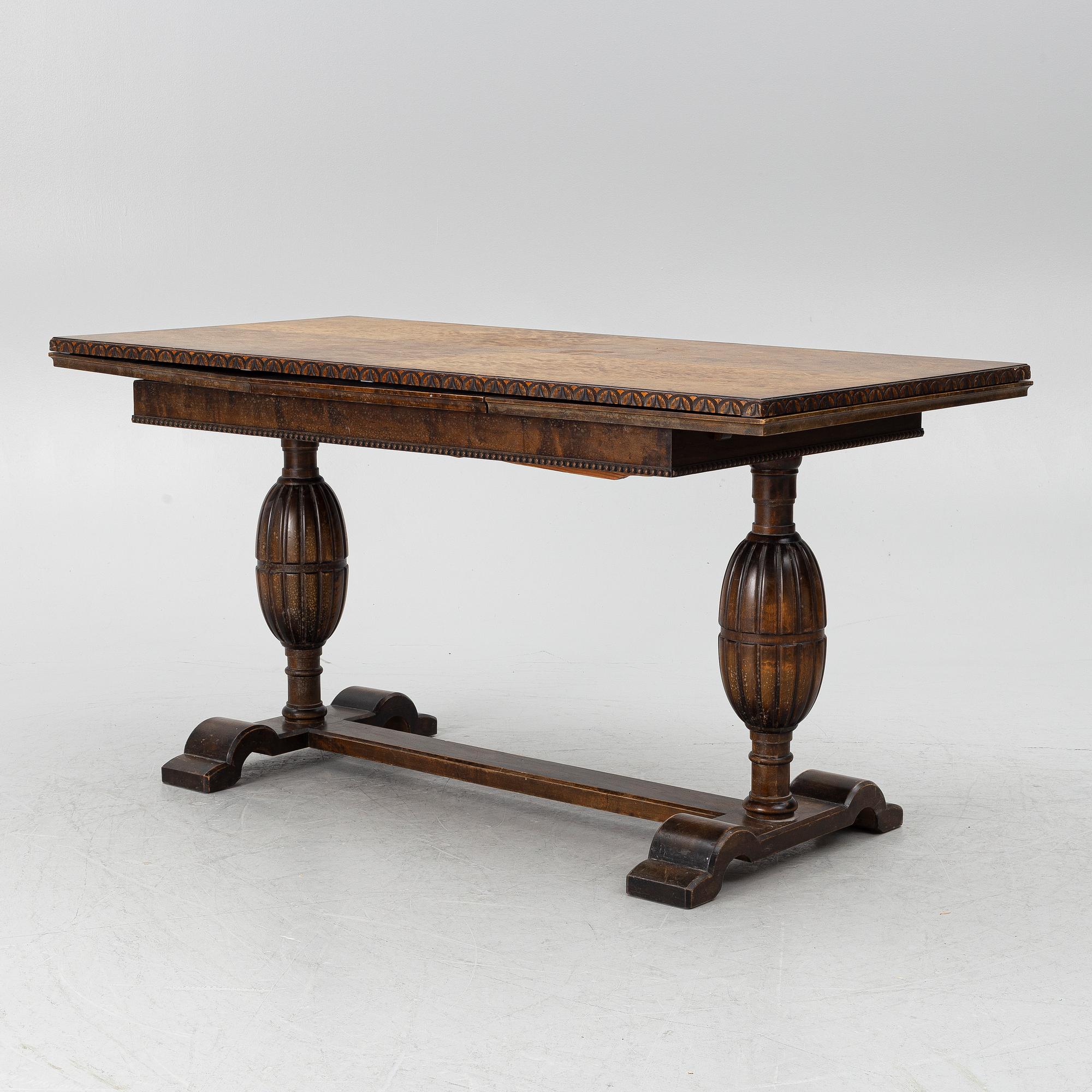 A dining table, 1920s.