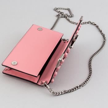 A Prada leather mini bag " Cahier" with metal details and rivets. Marked "Prada Milano". Authenticity card included.