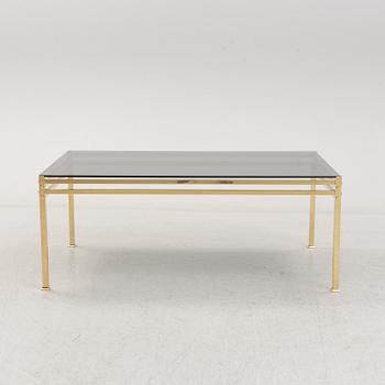 A second half of the 20th century glass and metal coffee table.