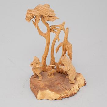 Jutsajaure, sculpture group, carved wood, signed M.S.