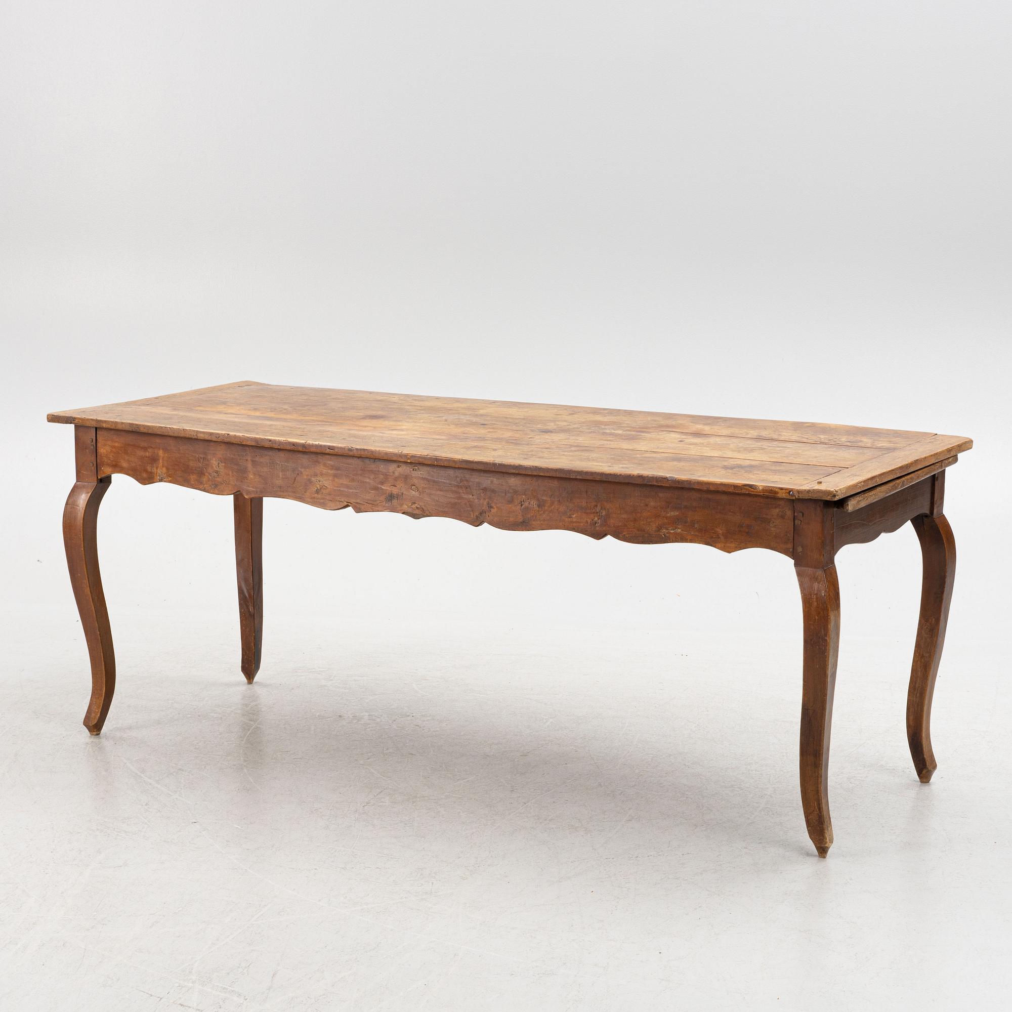 A Rococo Dining Table, 18th Century.
