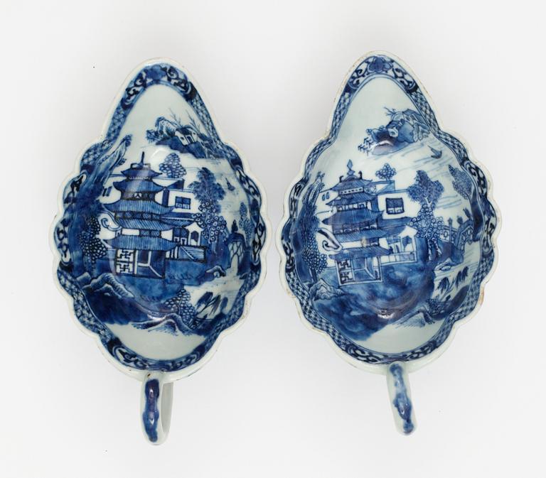 A pair of blue and white sauce boats, Qing dynasty. Qianlong (1736-95).