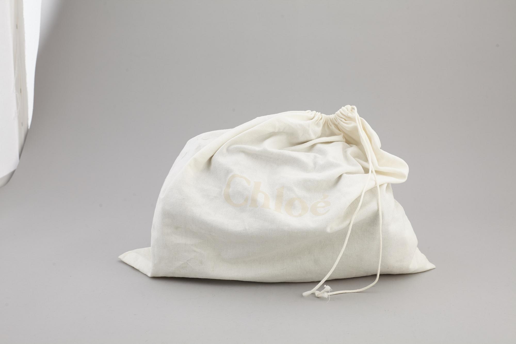 CHLOÉ, a metallic leather 'Paddington' bag.