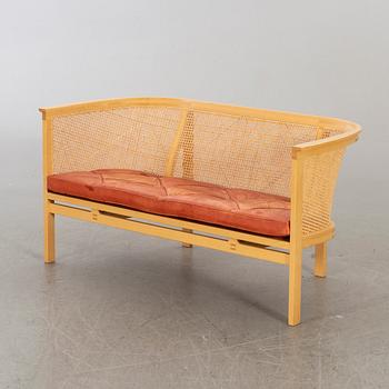 A sofa and an armchair in "Kongeserien" by Rud Thygesen & Johnny Sörensen. Designed in 1968.
