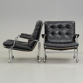 Bruno Mathsson, a pair of "Karin" easy chairs, DUX, Sweden post 1969.