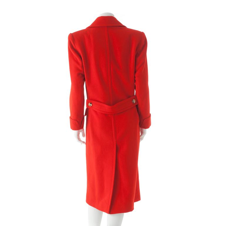 CÉLINE, a red cashmere and wool coat.