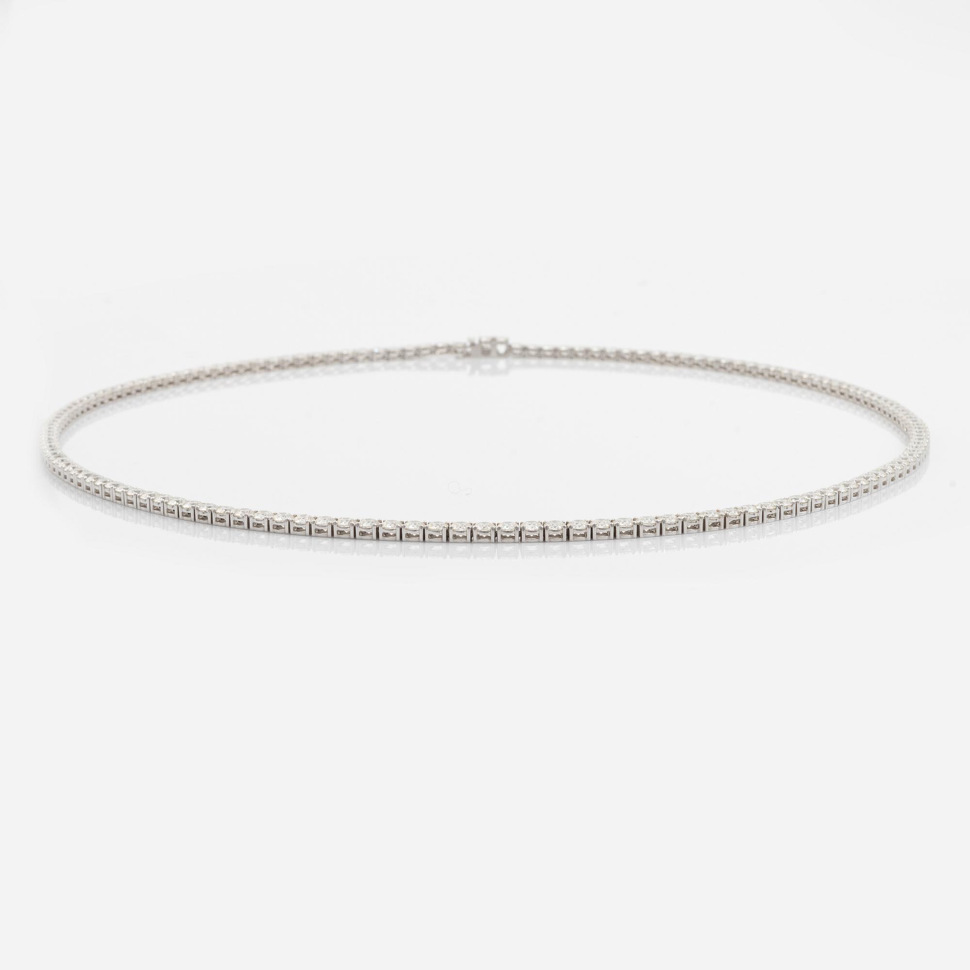 Collier rivière 18K vitguld med 148 runda briljantslipade diamanter.