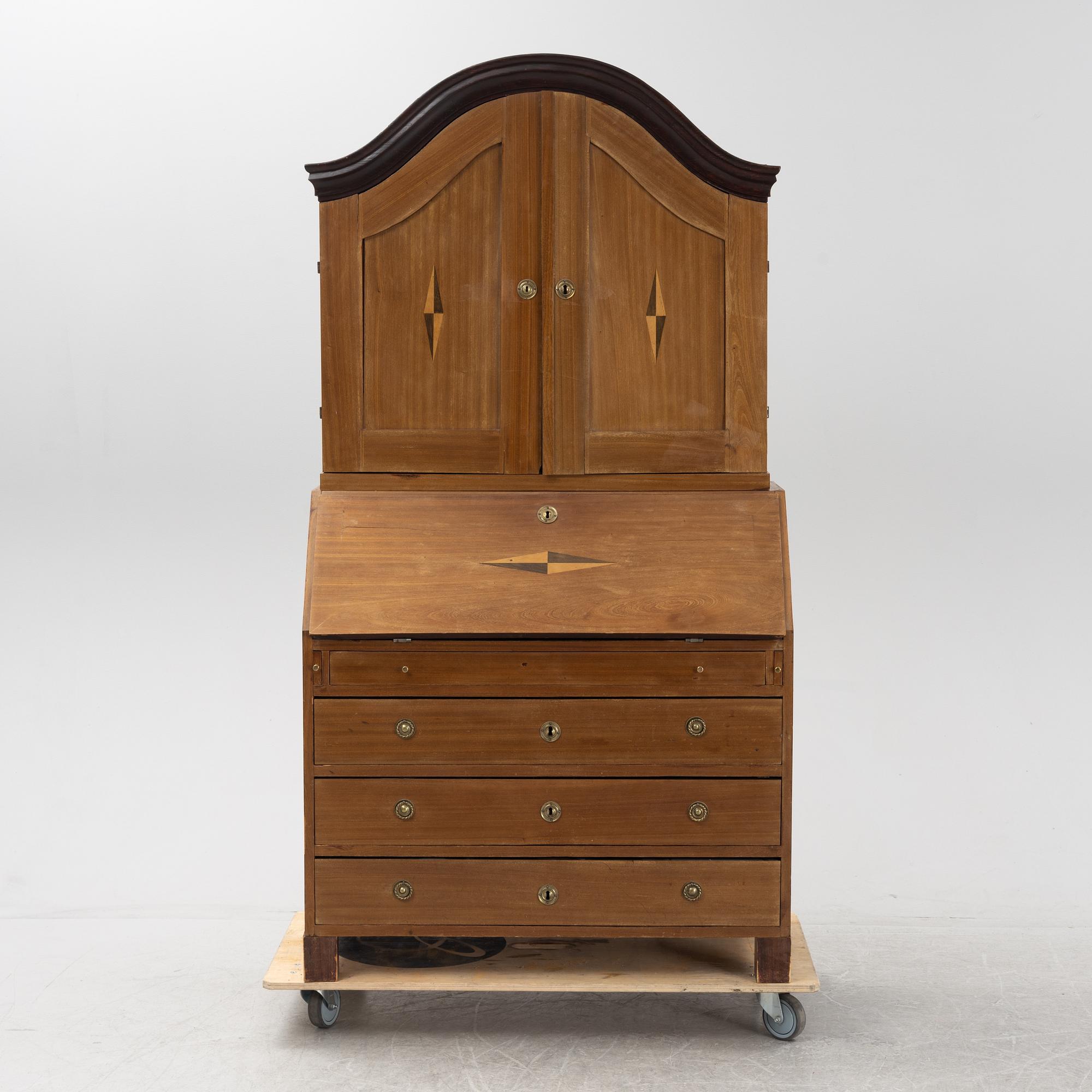 A mahogany-veneered Empire cabinet, first part of the 19th Century.