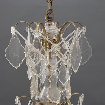 A Rococo style chandelier, early 20th Century.