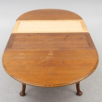 Dining table, 8 chairs, 2 armchairs, sideboard, Rococo style, early 20th century.