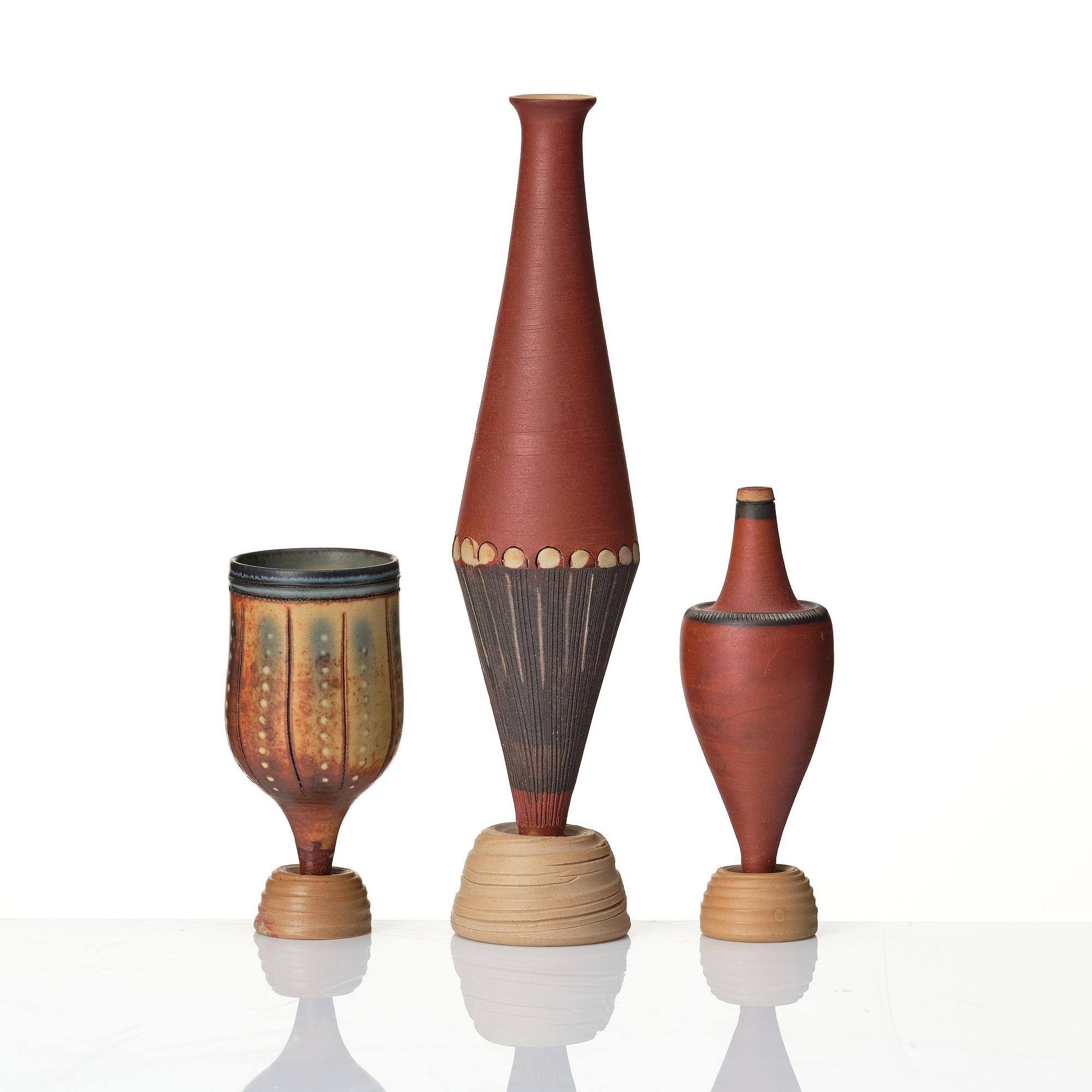 Wilhelm Kåge, a set of three miniature  'Farsta Spirea' stoneware vases, Gustavsberg studio, Sweden, one dated 1958.