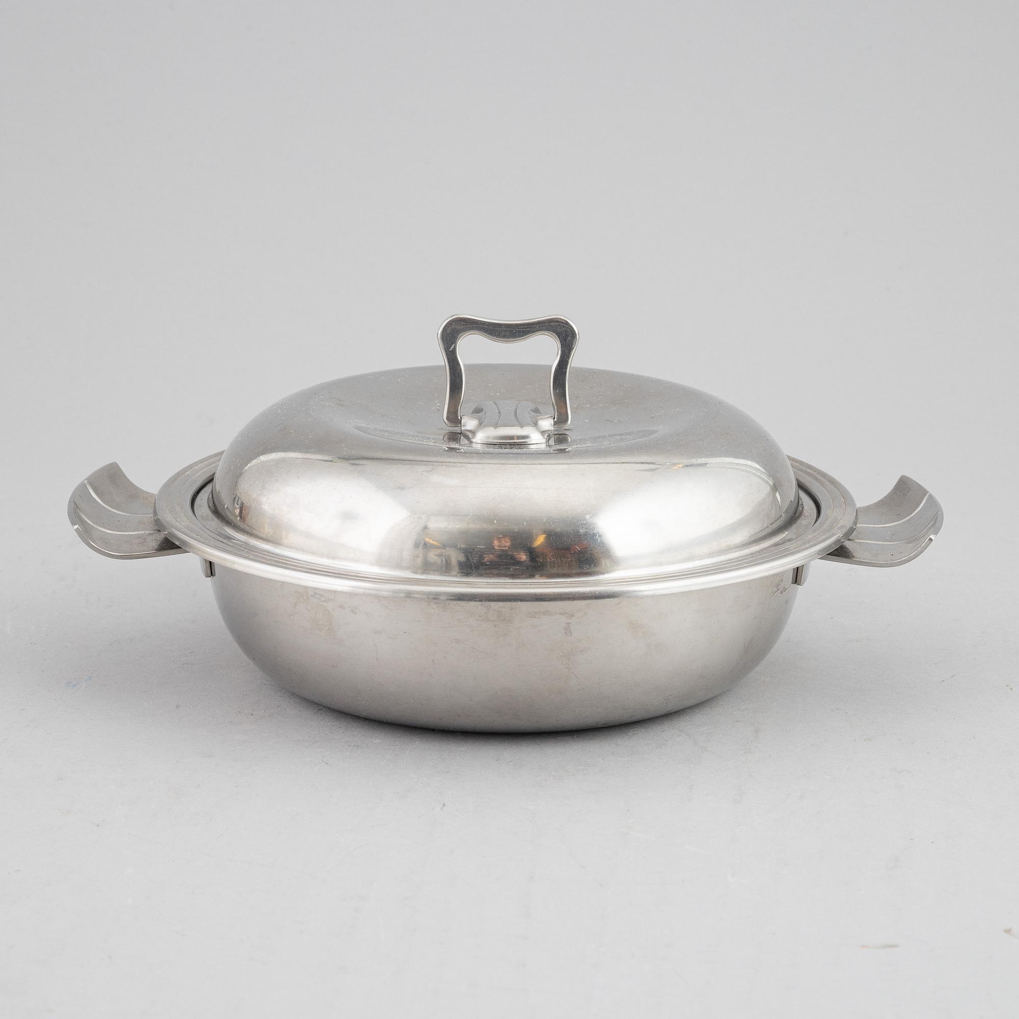 Eight stainless steal pieces to the 'Thebe' cutlry/dining service, Folke Arström, Gense, 1950's/60's.