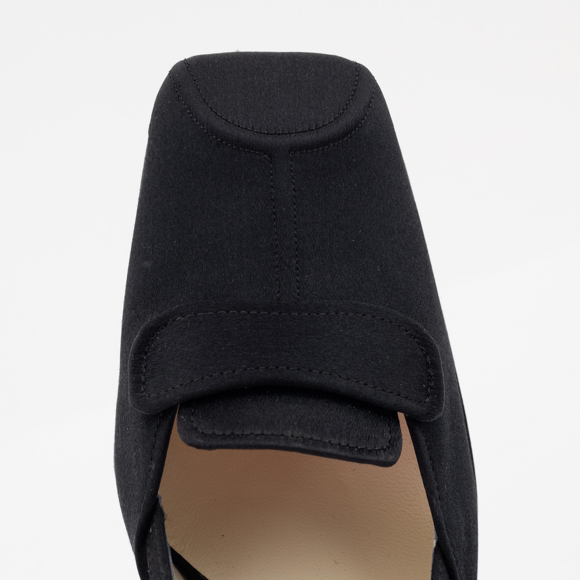 Prada, a pair of black silk pumps, size 36 1/2.