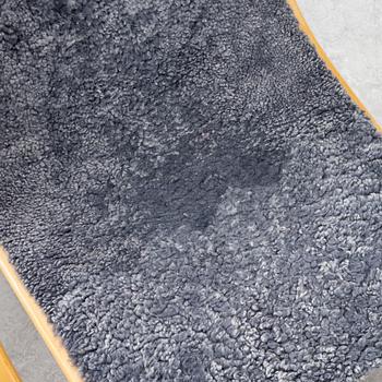 Yngve Ekström, armchair and footstool, "Lamino", Swedese.