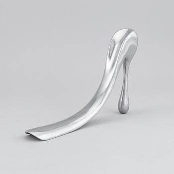 A metal shoe horn by Manolo Blahnik, 2000s.